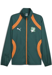 Green lightweight jacket featuring orange accents, a high collar, and a central zipper. Includes a logo of Côte d'Ivoire and Puma branding.