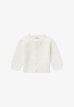 Hvid strikket cardigan med lange ærmer, med en rund halsudskæring, seks knapper foran og et lille emblem på venstre bryst.
