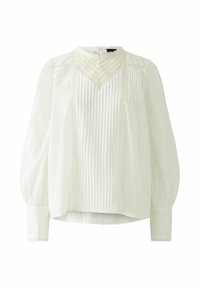 White blouse made of cotton with a pleated front, high neckline, and puffed long sleeves. Features lace trim at the cuffs and yoke.