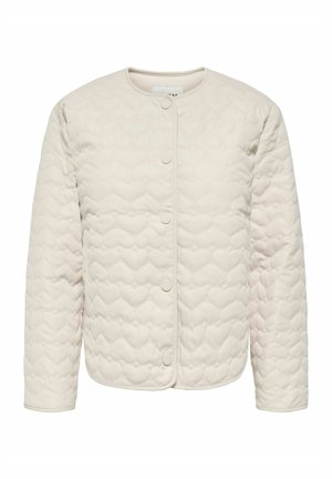 Kreemivärvi pitsiline jope südamekujulise tikandiga, ümara kaelusega, pika varrukaga ja esiküljel rõhknappidega sulgur.