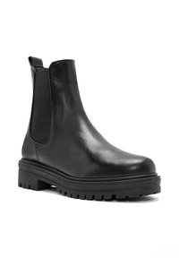 Czarne skórzane botki Chelsea z gładkim wykończeniem, elastycznymi bocznymi panelami oraz grubą gumową podeszwą z bieżnikiem.