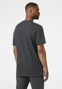 Helly Hansen NORD GRAPHIC - Camiseta estampada - ebony