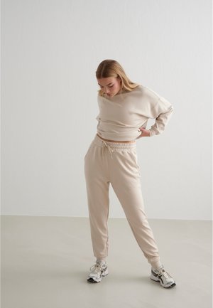 COMFY - Tracksuit bottoms - cafe au lait