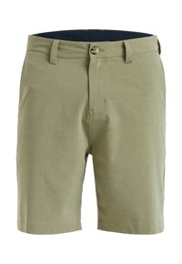 Szmizjerki o dopasowanym kroju wykonane z lekkiego oliwkowo-zielonego materiału, z zapięciem na guzik, przednimi kieszeniami i gładką fakturą.