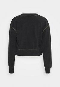Schwarzer, kurz geschnittener Sweatshirt mit langen Ärmeln, aus weichem Material. Verfügt über kontrastierende Nähte entlang der Säume und einen abgerundeten Halsausschnitt.