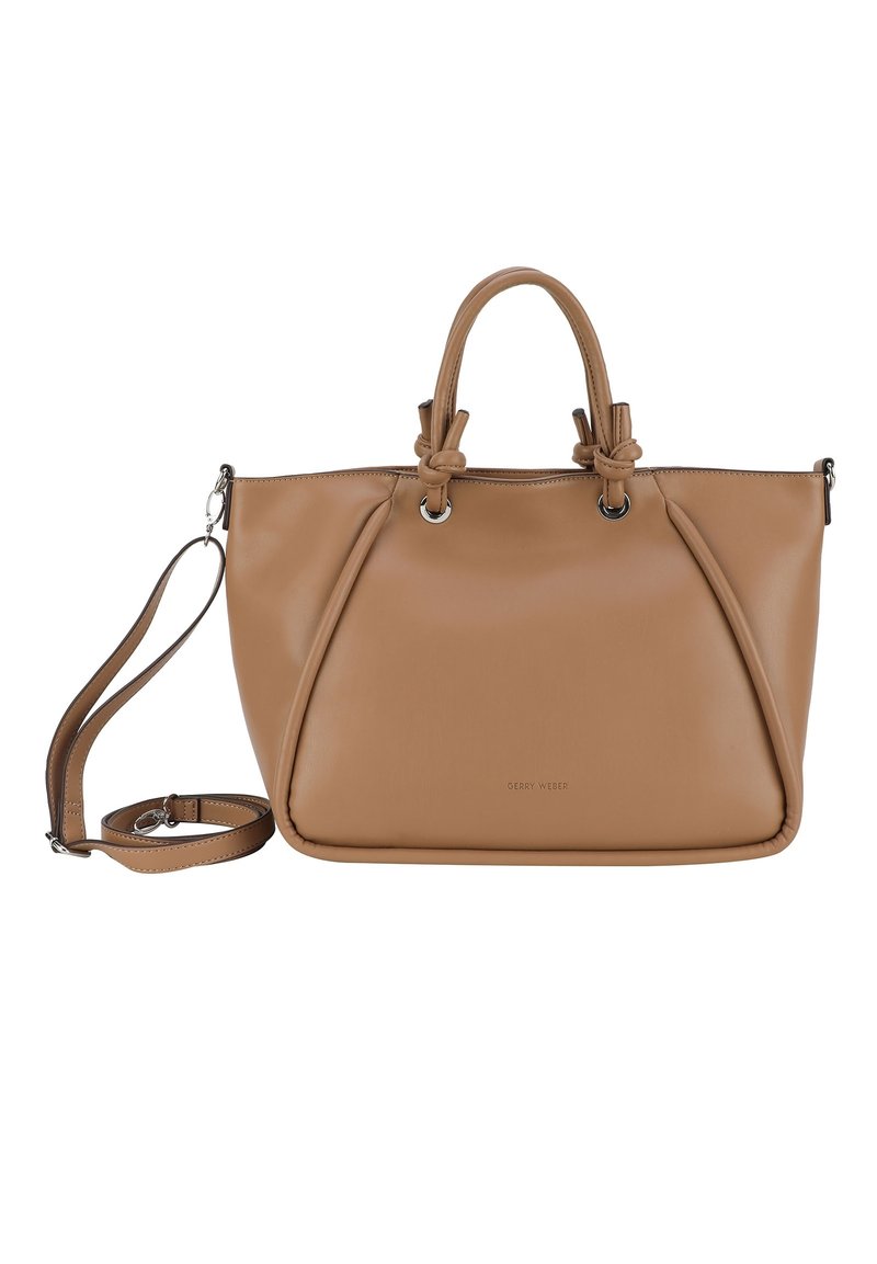 Vaaleanruskea nahkainen käsilaukku, jossa on kaksi yläkahvaa ja säädettävä olkahihna. Koristeena solmittuja yksityiskohtia ja hopeisia varusteita. Sujuva, rakenteellinen muotoilu.