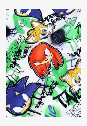 Katoen stof met kleurrijke cartoongezichten van personages met levendige ontwerpen. De achtergrond bevat groene en zwarte graffiti-stijl tekst en patronen.