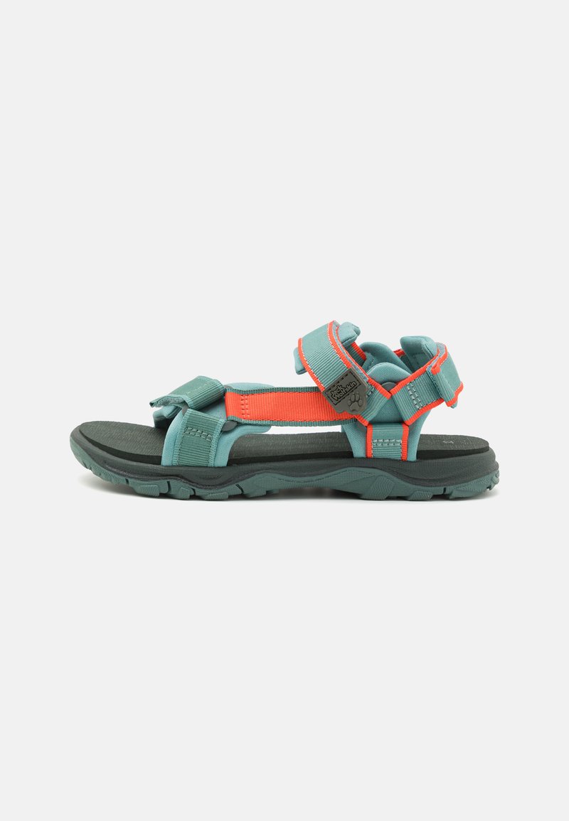 Teal and orange outdoor sandals with adjustable straps, textured black sole, and a cushioned footbed for comfort. Features durable material design.