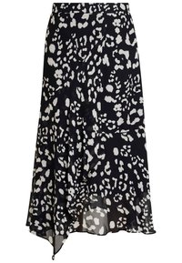 Jupe à motifs léopard noir et blanc en tissu léger, dotée d'un ourlet asymétrique et d'un design fluide.