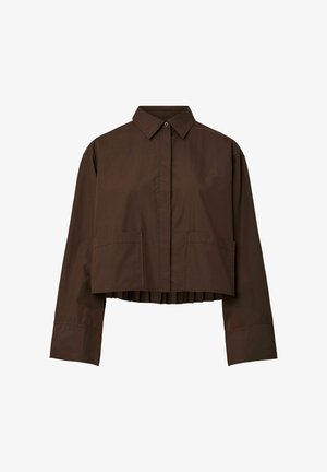 Brun cropped skjorte med lange ærmer, krave, to forlommer og en plisseret kant. Lavet af en glat, struktureret stof.