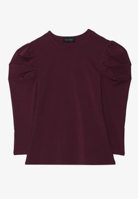Burgundyröd långärmad topp med samlade puffärmar, rundad hals och mjuk textur. Märket syns vid halsringningen. Enkel, figurnära design.