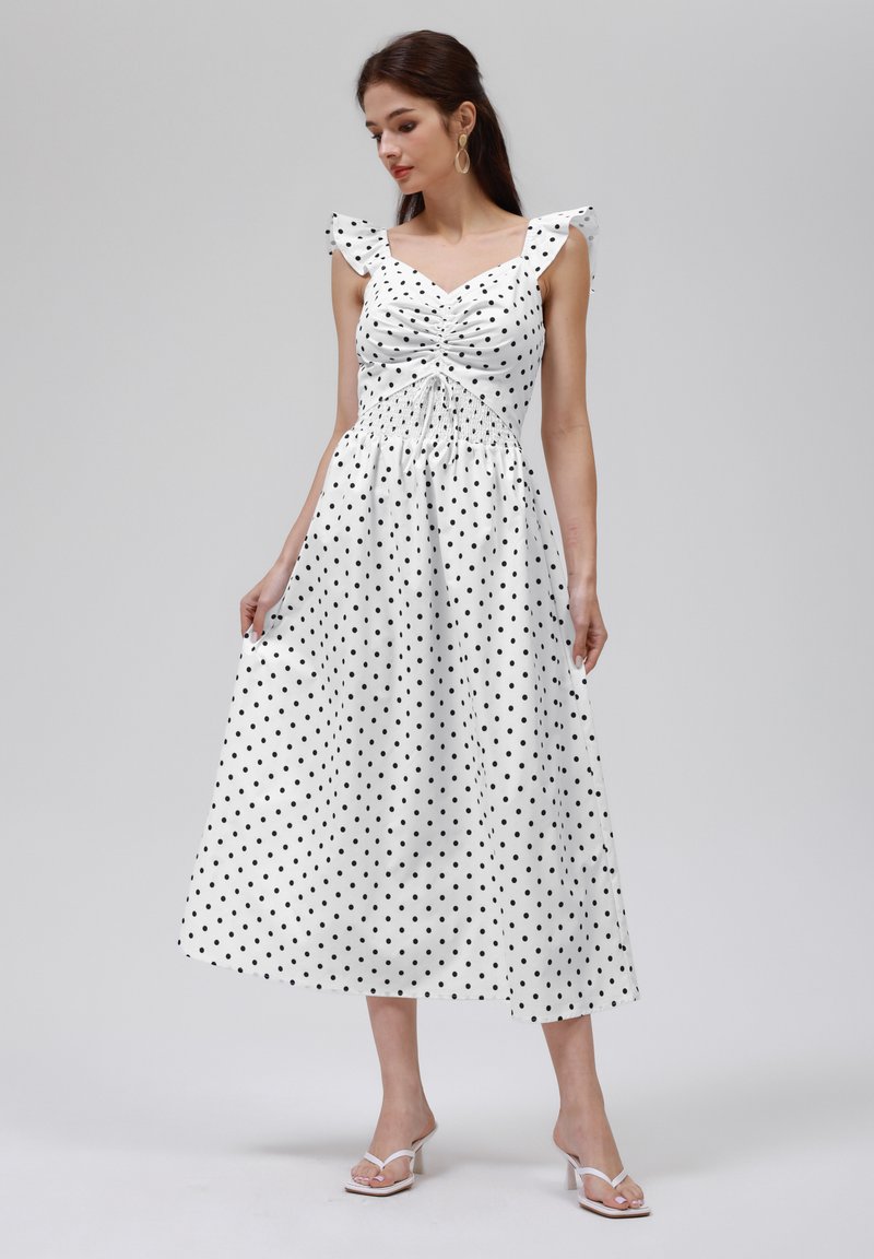 bloomingdales black dresses WHITE AND BLACK SPOT JACQUARD A-LINE STRAPLESS GOWN – Carla Zampatti main image 1