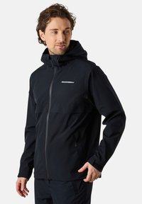 Black waterproof jacket with a high collar and adjustable hood. Features front zipper, side pockets, and reflective accent on chest.