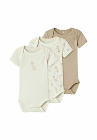 Trois bodies pour bébé : crème clair avec un motif de girafe, crème avec des motifs animaliers, et uni marron clair. Tous ont des manches courtes et des fermetures à pression.