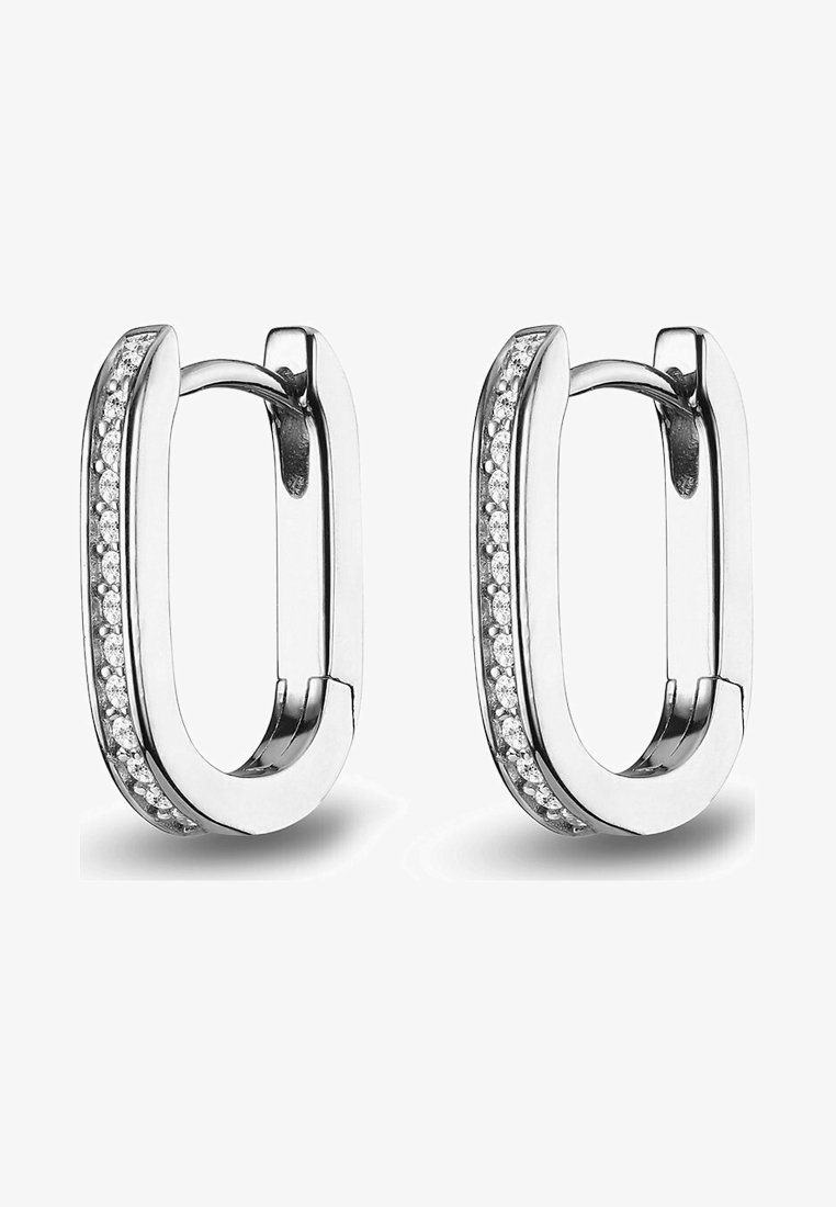 Silver hoop earrings with an oval shape, featuring a row of small clear crystals along one edge, polished finish, and a hinge closure.