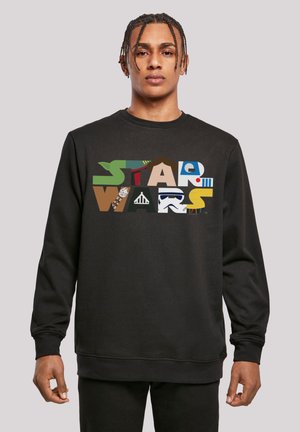 Schwarzer Pullover mit einem mehrfarbigen "STAR WARS"-Grafikdesign in verschiedenen Texturen und Mustern, aus einem weichen Stoff mit lockerer Passform.