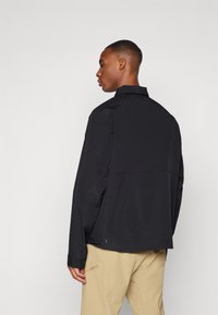 Helly Hansen ESCAPE JACKET - Blouson - black