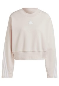 Kortärmad sweatshirt i mjuk ljusrosa tyg med vita tre-stripa detaljer längs ärmarna och en liten vit logotyp.