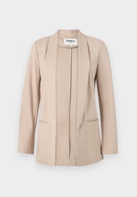Blazer beige pour femme à ouverture devant, manches longues, col châle et deux poches avant horizontales.