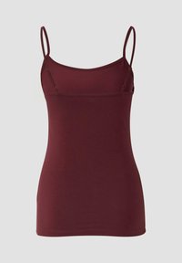 Burgundowy top na ramiączkach wykonany z elastycznego materiału, z cienkimi, regulowanymi ramiączkami i dopasowanym krojem, o gładkiej fakturze i bez widocznych wzorów.