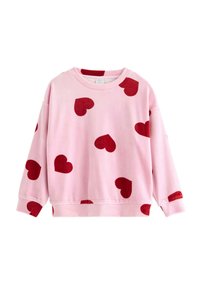 Lyserød sweatshirt med en blød tekstur og røde hjerte-mønstre spredt over det hele. Lange ærmer og en rund halslinje fuldender designet.