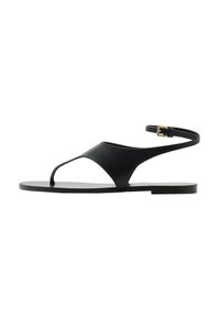 Sandale negre plate cu un design minimalist, având o singură curea și cataramă la gleznă. Fabricate dintr-un material neted, cu o talpă plată.