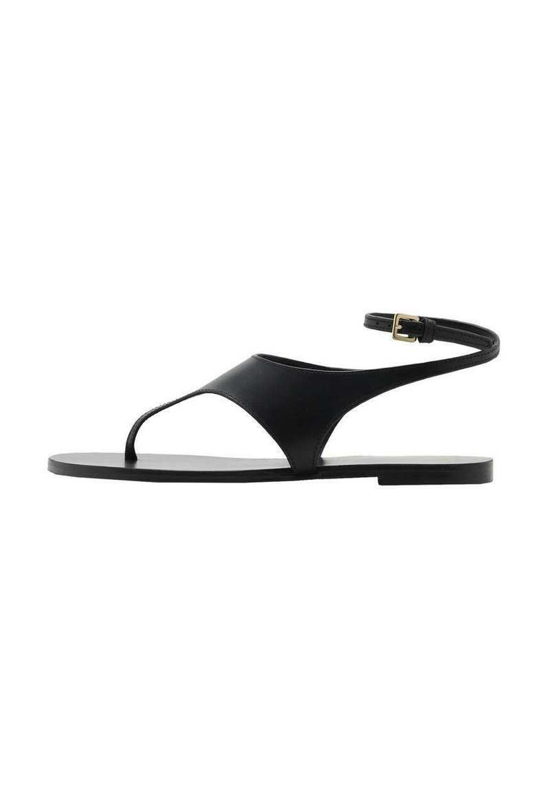 Sandale negre plate cu un design minimalist, având o singură curea și cataramă la gleznă. Fabricate dintr-un material neted, cu o talpă plată.