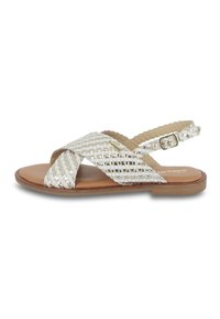 Silver woven flat sandals with crossover straps, beige synthetic insole, adjustable ankle strap, and a smooth brown outsole.