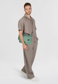 Mammut XERON MESSENGER 40 CM - Borsa a tracolla - dark jade