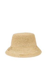 Looduslikust riidest nokkmüts beežis värvitoonis, millel on ümar, struktureeritud ülaosa ja lai, paindlik äär avatud punutise mustriga.