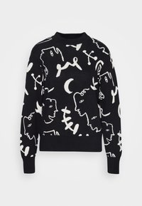 Schwarzer Strickpullover mit einem weißen abstrakten Muster aus Gesichtern und Formen. Ribbelbündchen und -kragen für zusätzliche Textur und Details.