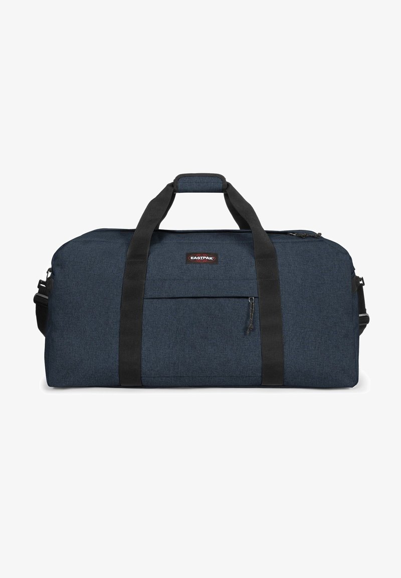 耐用的海军蓝旅行袋,配有黑色肩带、前拉链口袋和矩形形状。由纹理面料制成。品牌标志印在袋子上。