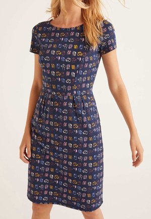 Robe marine à silhouette ajustée, manches courtes, et un motif de dessins colorés à la main. Tissu doux, longueur au genou.