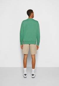 Tommy Hilfiger LOGO - Camisola - central green