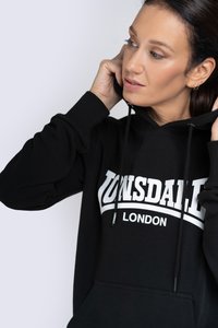 Black hoodie with white "LONSDALE LONDON" logo, drawstrings, ribbed cuffs, and a front pocket. Soft material with a relaxed fit.