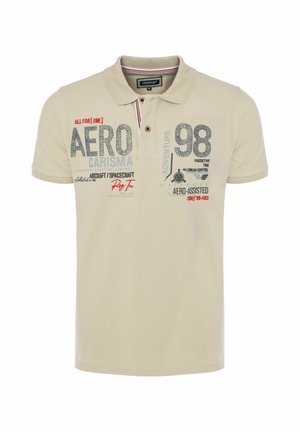 Beige polo-shirt med krave, knapper og trykt tekst inklusive "AERO," "98" og "AIRCRAFT/SPACECRAFT" foran.