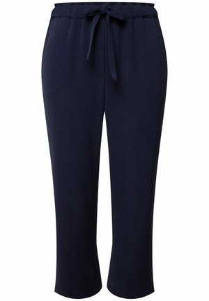 Pantaloni cropped blu navy realizzati in tessuto morbido con elastico in vita e dettagli con lacci, caratterizzati da una texture liscia e un design semplice.