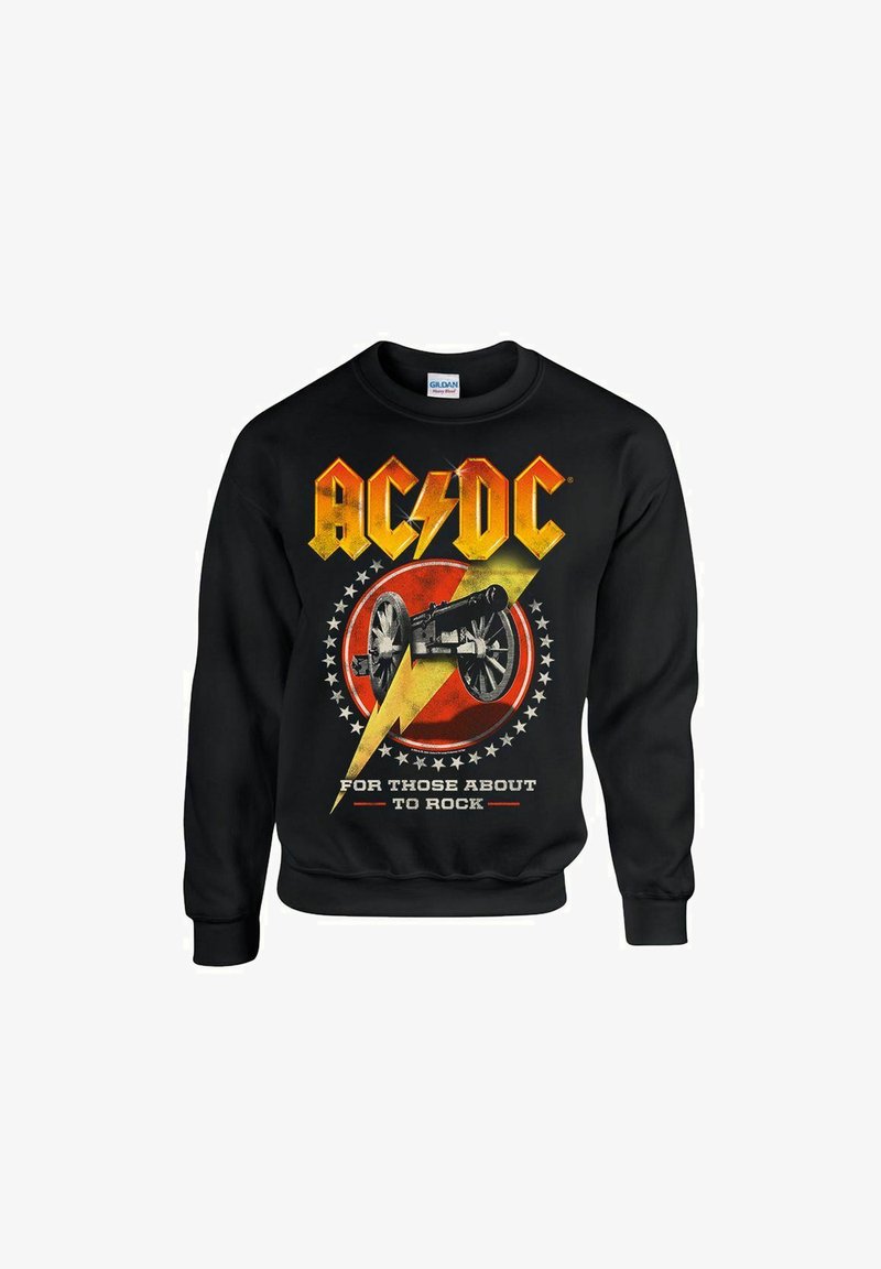 Schwarzer Pullover mit auffälligem "AC/DC"-Text, einer Kanonengrafik, einem gelben Blitz und einem roten runden Akzent mit weißen Sternen.