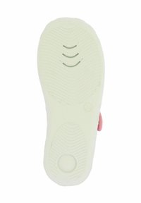 Weiße Gummisohle mit strukturierten Mustern und runden Akzenten. Verfügt über Rillen für besseren Grip und ein pinkes Stoffdetail entlang der Seite.