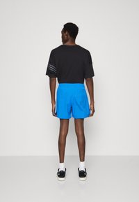 adidas Originals SPRINTER - Shorts - bluebird