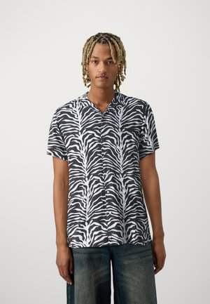 Ing - optic white/jet black