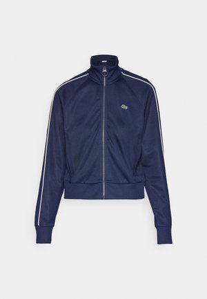 Lacoste Jaka ar rāvējslēdzēju - navy blue/flour