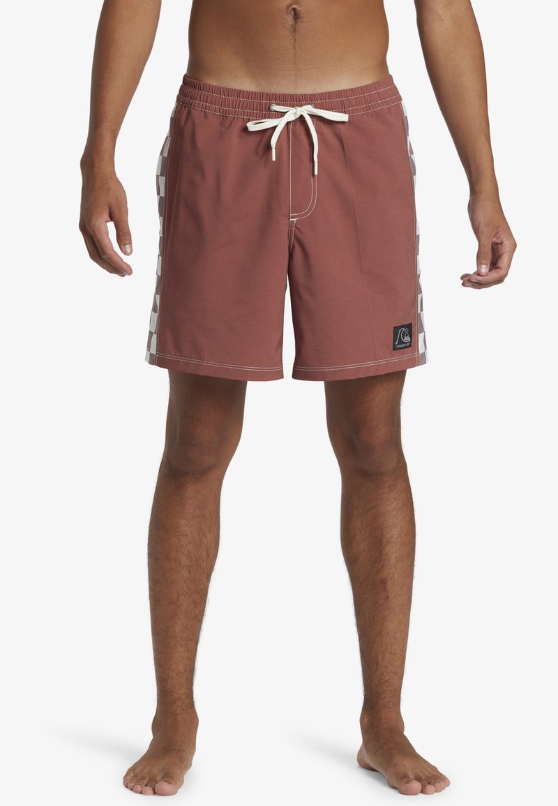 Men's swim shorts in a reddish-brown color, featuring a checkerboard pattern on the sides, elastic waistband, and drawstring closure.