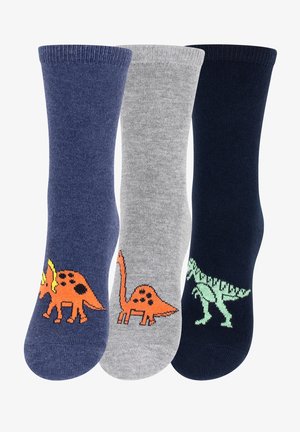 Drei Paar Baumwollsocken: dunkelblau mit orangefarbenem Dinosaurierdruck, grau mit orangefarbenem Dinosaurier, marineblau mit grünem Dinosaurier. Rippbündchen.
