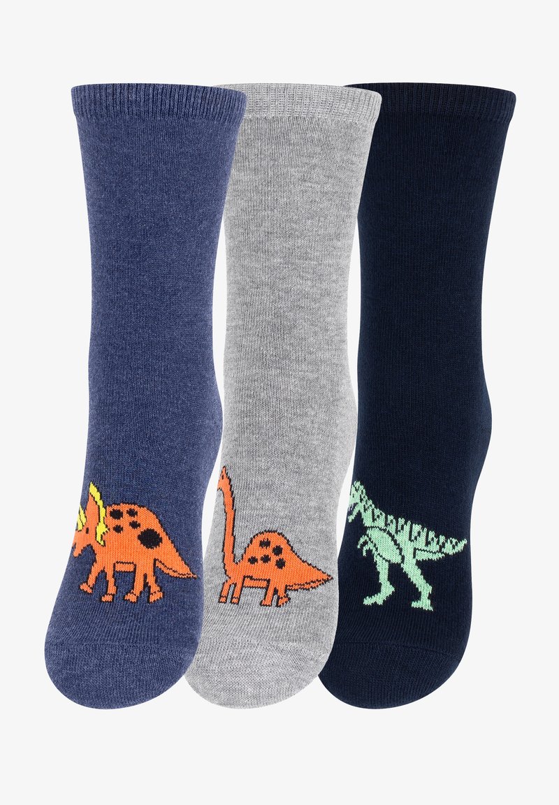 Tre paia di calzini di cotone: blu scuro con stampa di dinosauro arancione, grigio con dinosauro arancione, blu navy con dinosauro verde. Polsino a coste.
