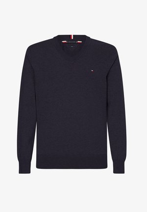 Maglione blu navy a scollo a V con maniche lunghe, polsini e orlo a costine, con un piccolo logo rosso, bianco e blu sul petto sinistro.