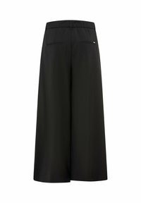 Pantalons larges noirs en tissu lisse, avec une taille élastique, deux poches arrière et un design minimaliste.
