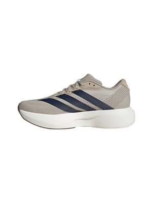 Hellgrauer Sportschuh mit schwarzen Streifen, Mesh-Obermaterial, Schnürverschluss und dicker weißer gepolsterter Sohle, seitlich gezeigt.