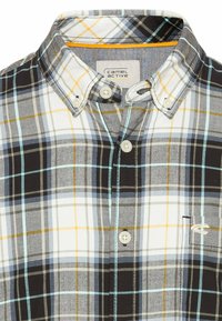 Kariertes Button-up-Shirt in Grau, Schwarz, Weiß und Gelb. Aus Baumwolle gefertigt, mit Umlegekragen und vorderer Knopfverschluss.