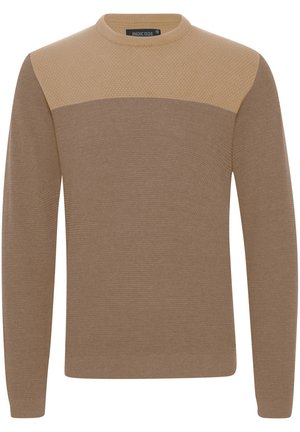 Bruine trui met een gestructureerde bovenkant en een gladde body. Kleurovergang van lichtbruin naar donkerbruin. Ronde halslijn en lange mouwen.